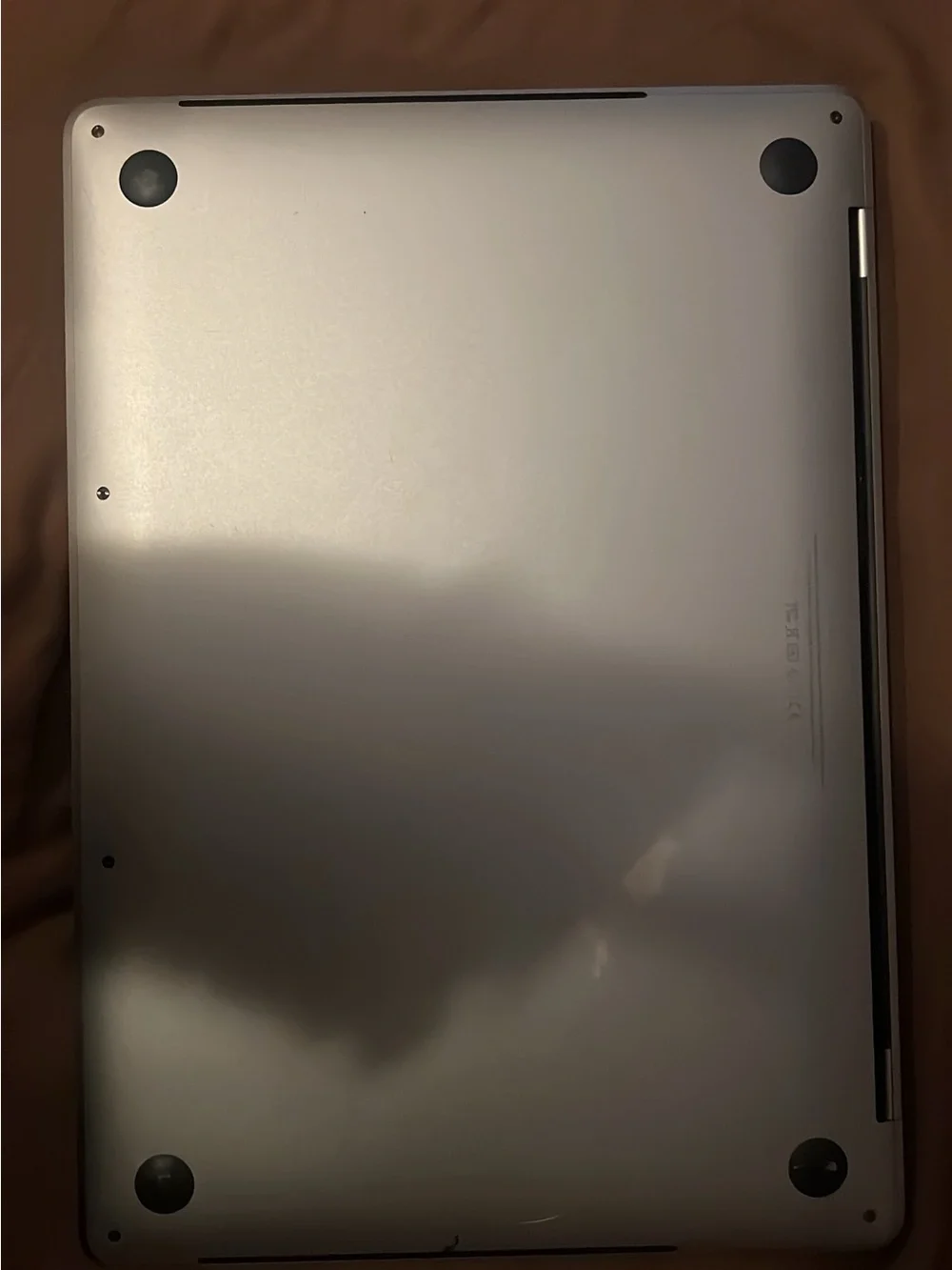 Apple MacBook Laptop in Silver with Black Apple Logo